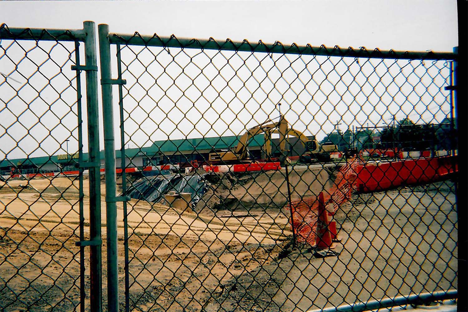 Rustic Mall Demolition - Digging Ground